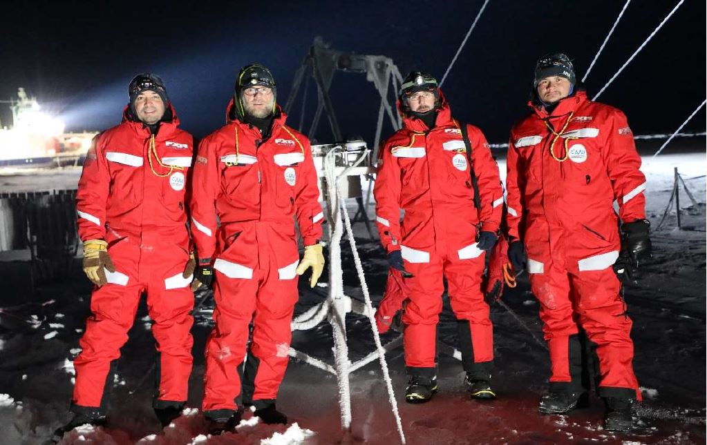 MOSAiC PI Matthew Shupe and instrument technicians on the ice